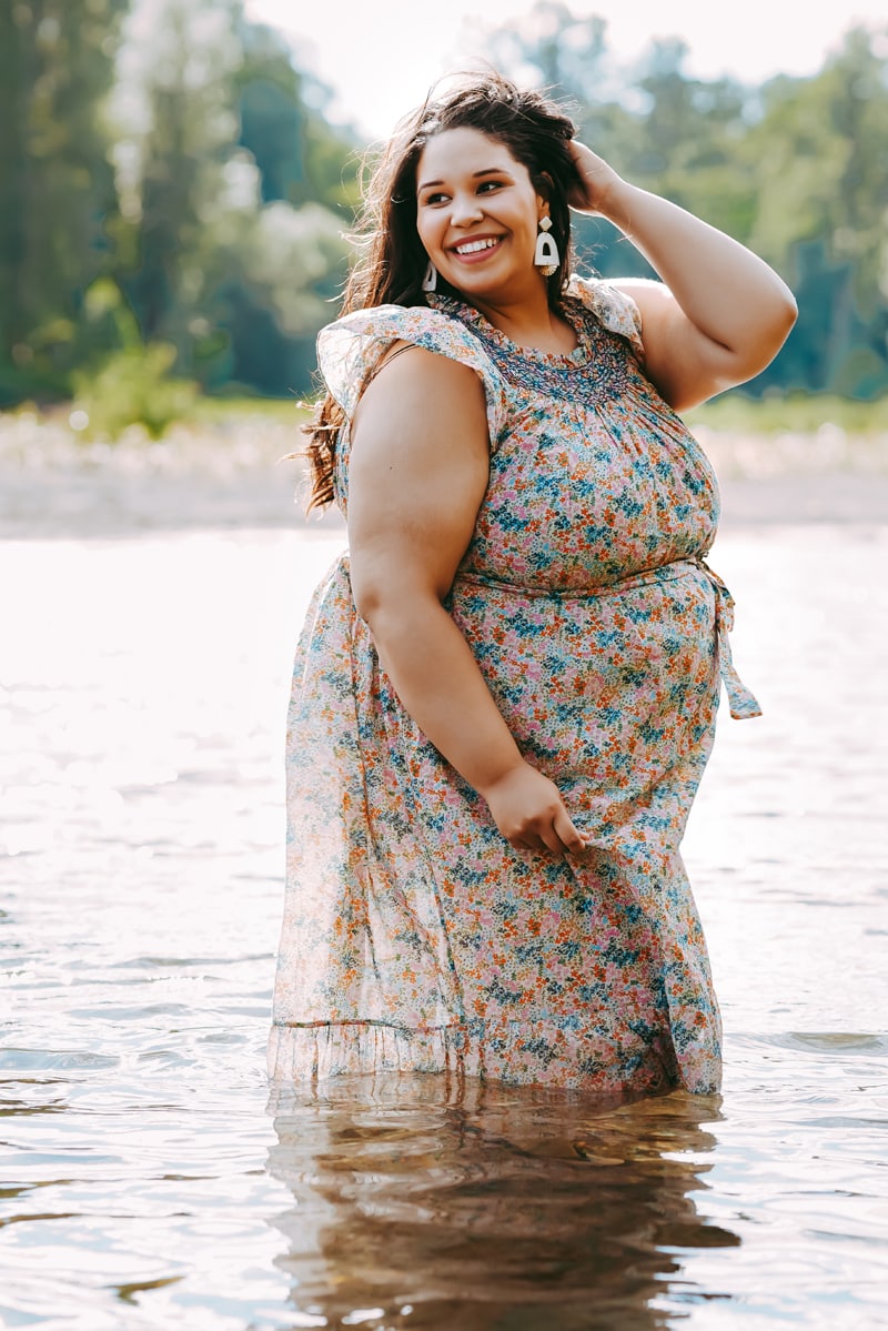 Seattle Maternity Photography, mother to be walks in a quiet river, she is happy